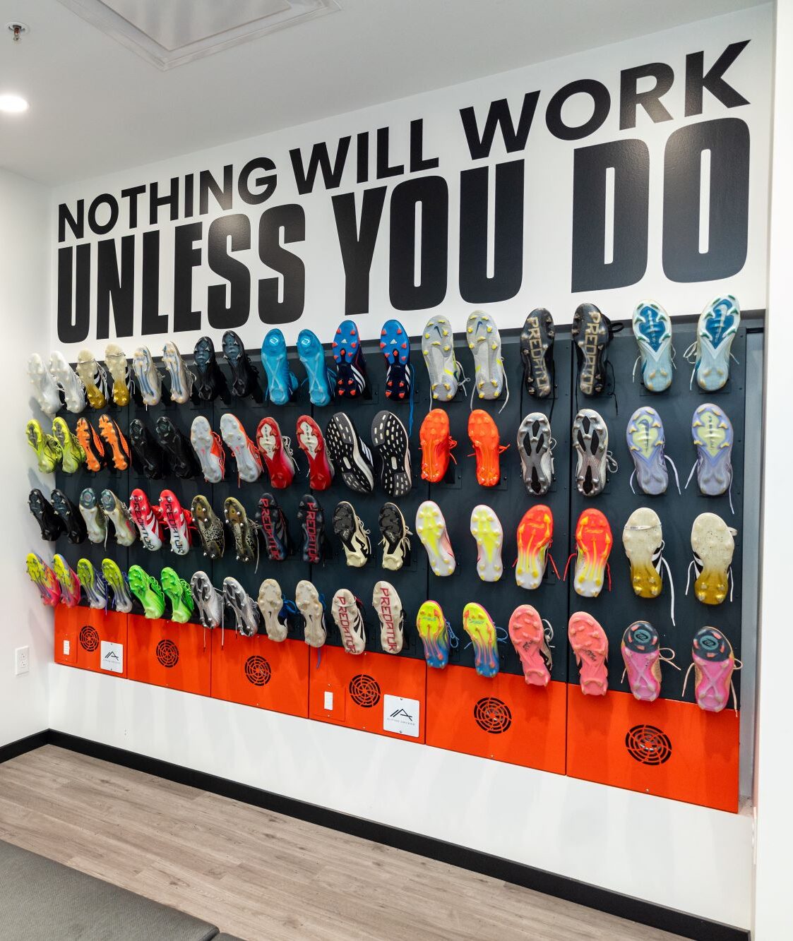 Interior shot of CCFC showing the shoe drying rack and sign that says 
