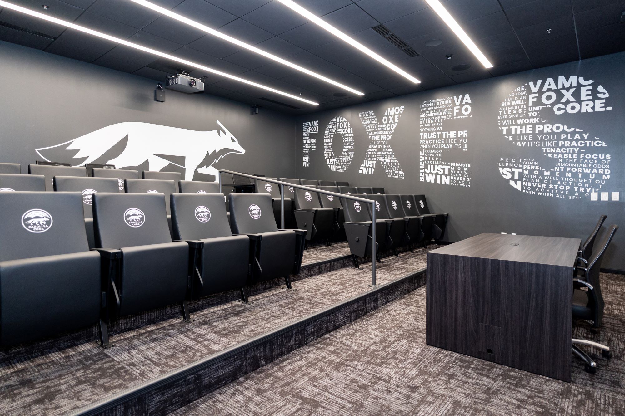 Interior Shot of CCFC viewing room showing movie theater style seating, Fox graphic on the wall