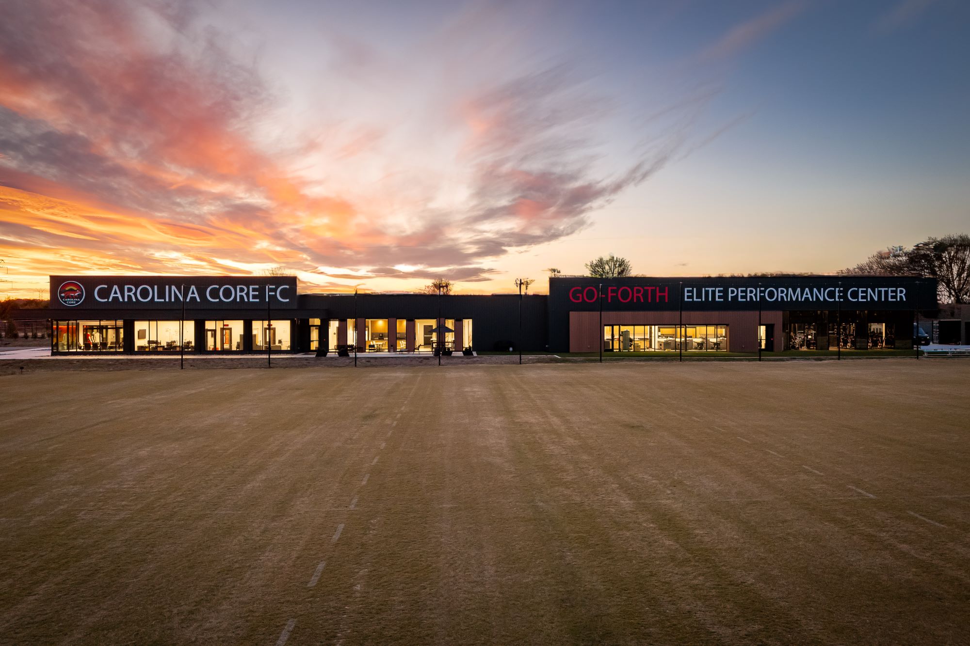 Exterior image of Carolina Core Football Club at sunset